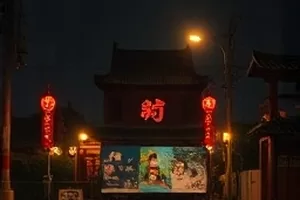 《朝歌衣冠》服装组手记封面：三套纹样铺展在长桌上
